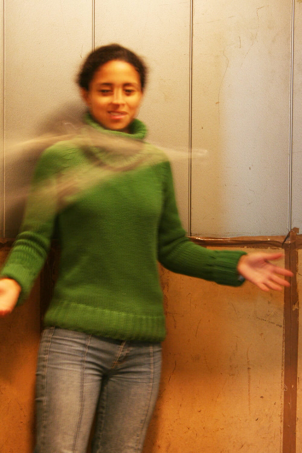 Interior view of a site-specific installation interacting with existing architectural supports and spatial axes.