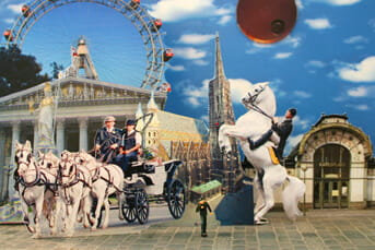 Photomontage collage, Viennese landmarks including Ferris wheel and baroque pavilion with horse-drawn carriage, miniature dancing man figurepositioned in foreground, layered against cloudy sky backdrop.